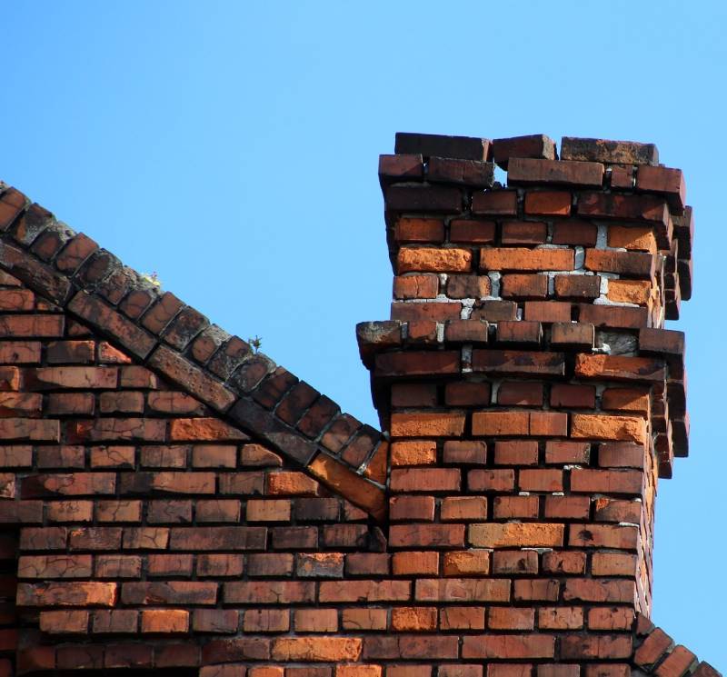 Signs Your Granada Hills Home Needs a Chimney Inspection Damaged chimney on an Granada Hills home showing cracks and missing mortar